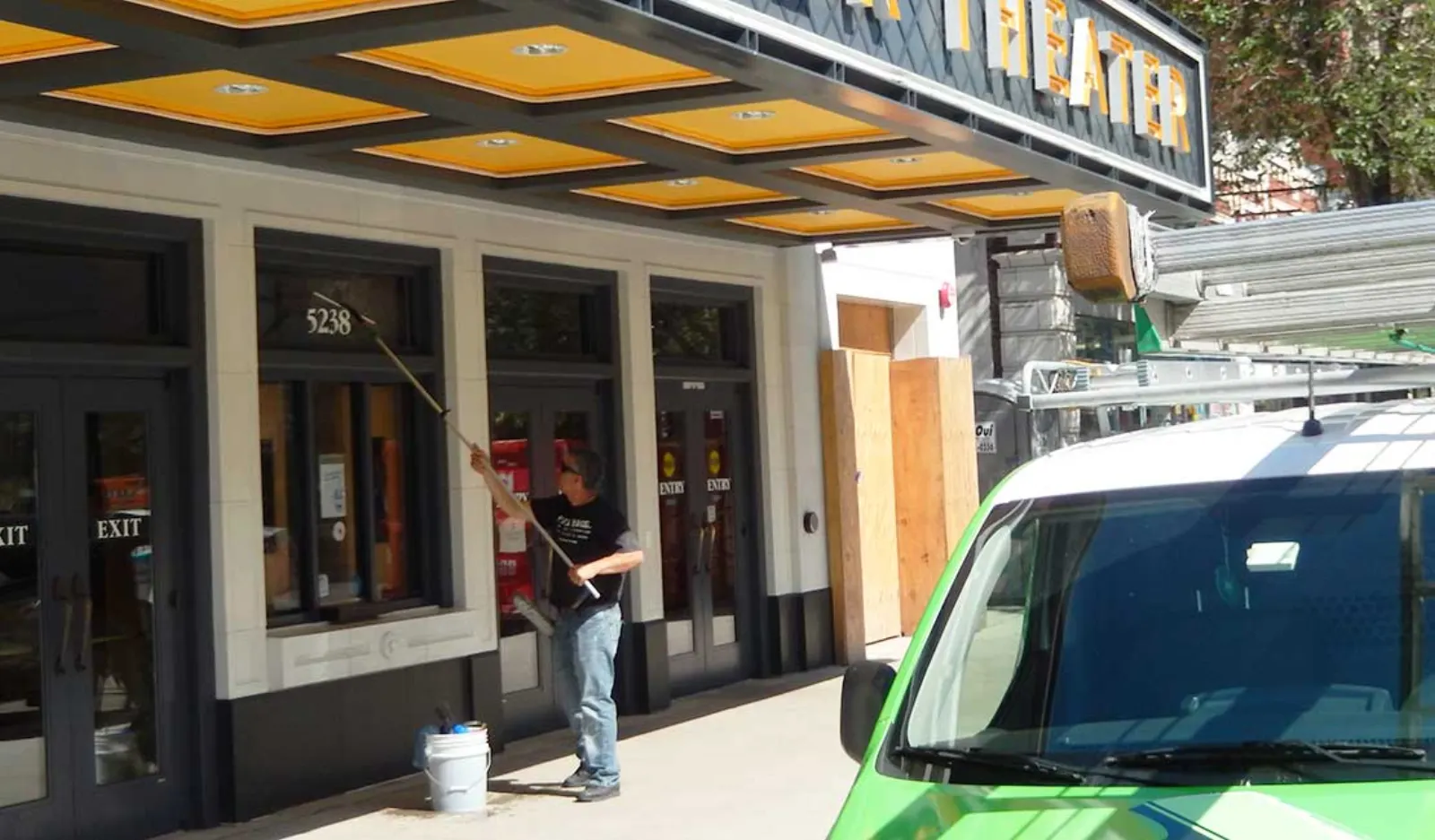 Pane Bros crew cleaning theater windows in Chicago